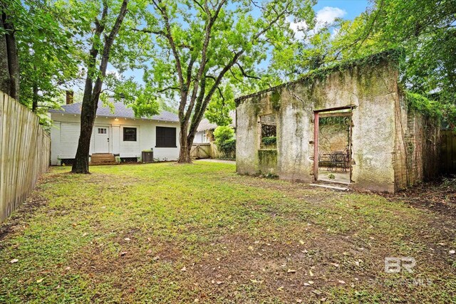 view of yard with central AC unit