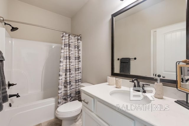 full bathroom featuring vanity, shower / tub combo with curtain, and toilet