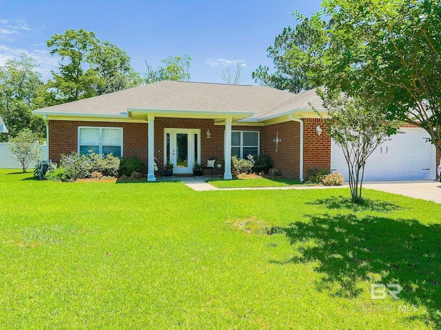 ranch-style home with a garage and a front lawn