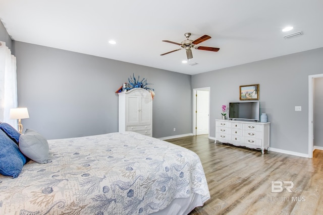 bedroom featuring wood-type flooring and ceiling fan