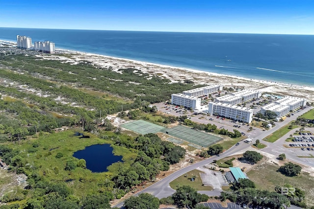 aerial view featuring a water view and a view of the beach