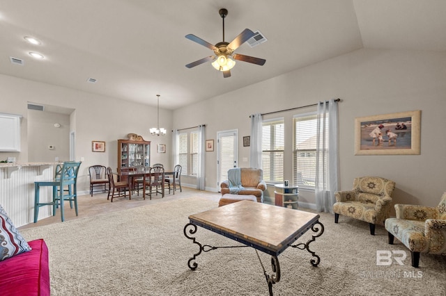 14766 Sonoma Blvd, Silverhill, AL 36576 - living area featuring lofted ceiling, light colored carpet, ceiling fan with notable chandelier, baseboards, and visible vents