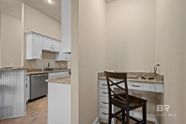 14766 Sonoma Blvd, Silverhill, AL 36576 - kitchen with a sink, white cabinetry, light stone countertops, dishwasher, and recessed lighting