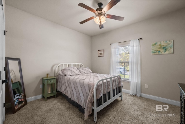 14766 Sonoma Blvd, Silverhill, AL 36576 - bedroom featuring baseboards, a ceiling fan, and carpet