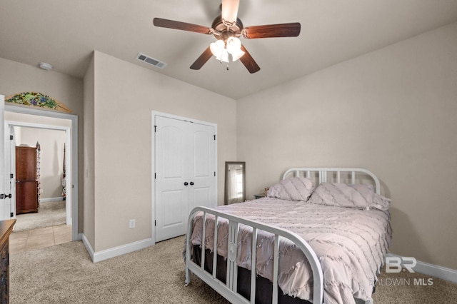 14766 Sonoma Blvd, Silverhill, AL 36576 - carpeted bedroom with baseboards, ceiling fan, visible vents, and a closet