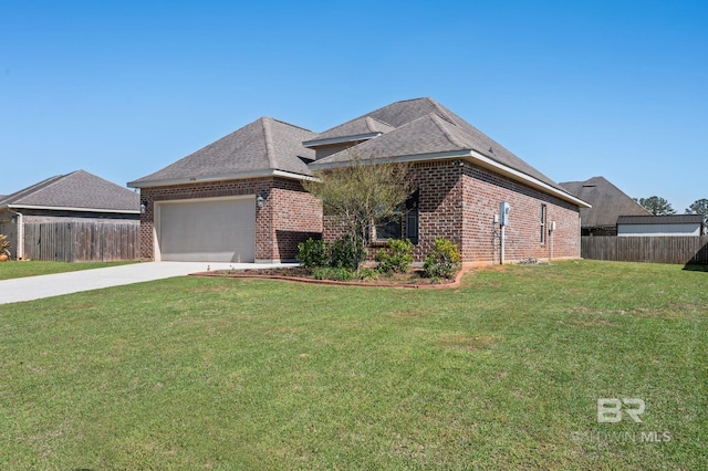 14766 Sonoma Blvd, Silverhill, AL 36576 - view of front facade with brick siding, fence, and a front lawn