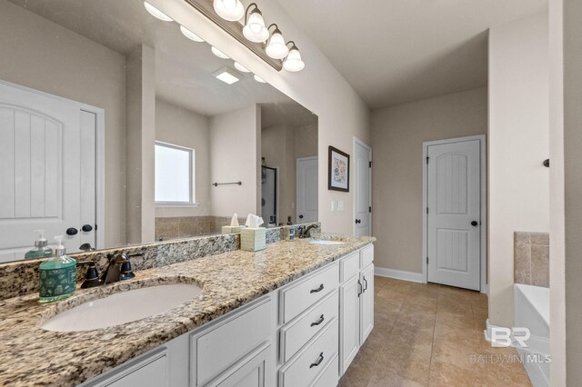 14766 Sonoma Blvd, Silverhill, AL 36576 - full bathroom with baseboards, double vanity, a sink, and tile patterned floors