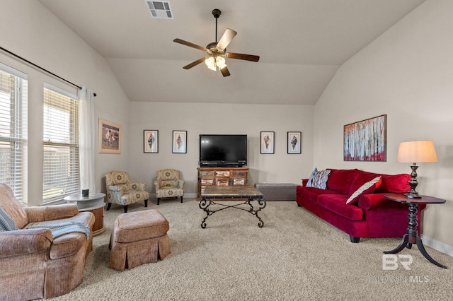14766 Sonoma Blvd, Silverhill, AL 36576 - living area with vaulted ceiling, visible vents, carpet flooring, and a ceiling fan