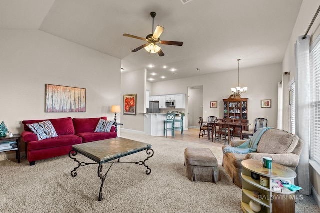 14766 Sonoma Blvd, Silverhill, AL 36576 - living area featuring baseboards, recessed lighting, light carpet, lofted ceiling, and ceiling fan with notable chandelier