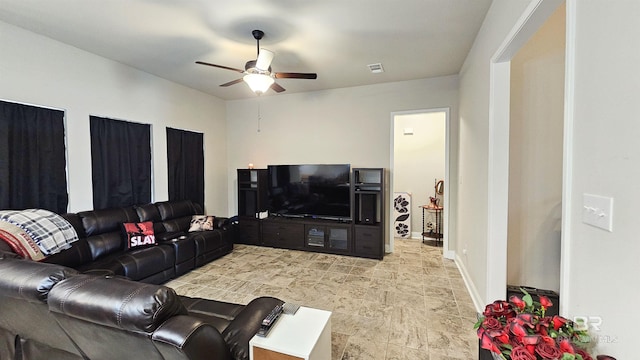 living room with ceiling fan