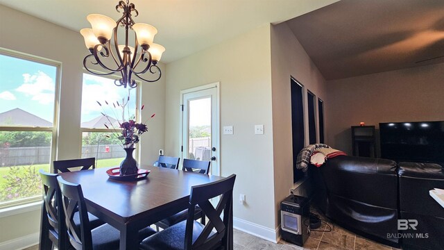 dining room featuring a chandelier