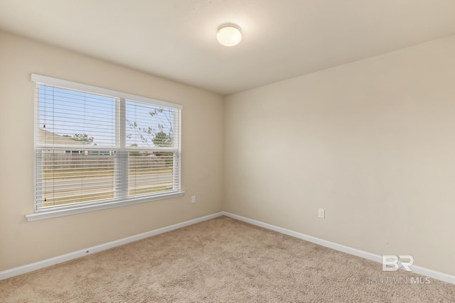 view of carpeted spare room