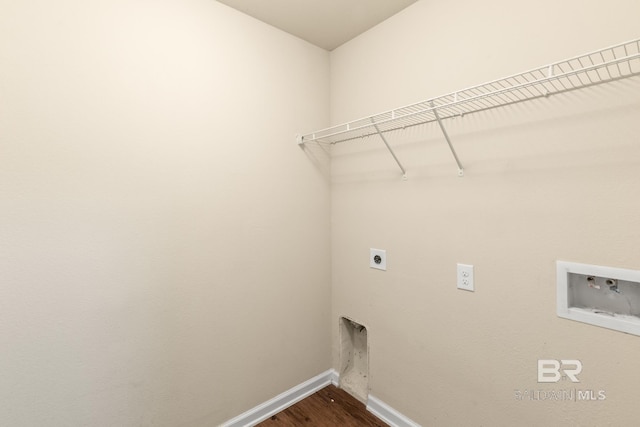 clothes washing area featuring electric dryer hookup, dark wood-type flooring, and hookup for a washing machine