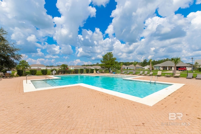 view of pool featuring a patio