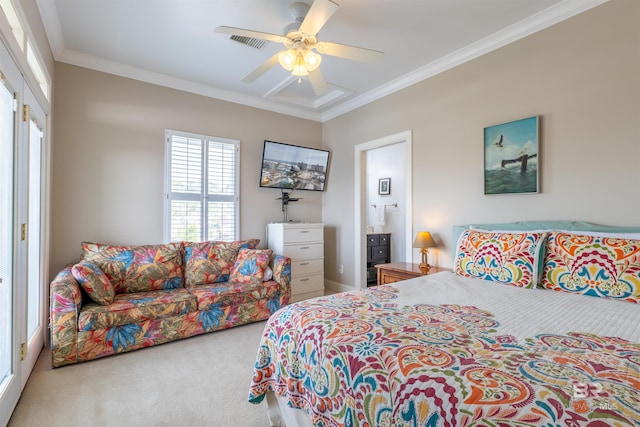 carpeted bedroom with ensuite bathroom, a ceiling fan, visible vents, and crown molding