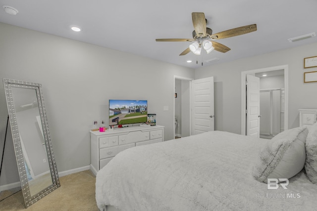 bedroom with ceiling fan and light colored carpet