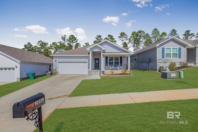 view of front of home with a garage and a front lawn