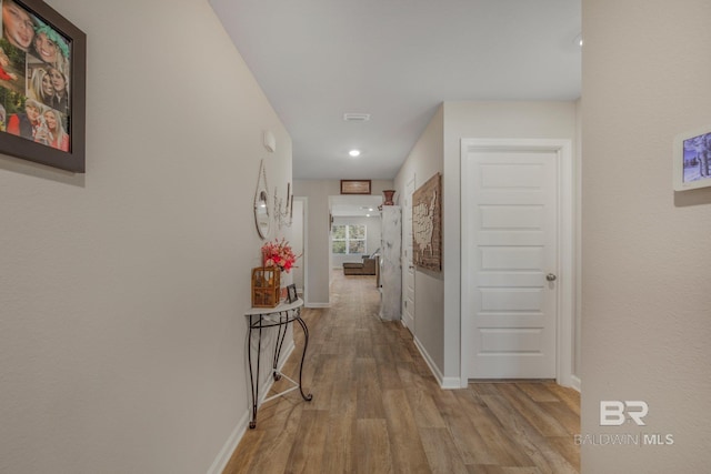 hall featuring light hardwood / wood-style floors