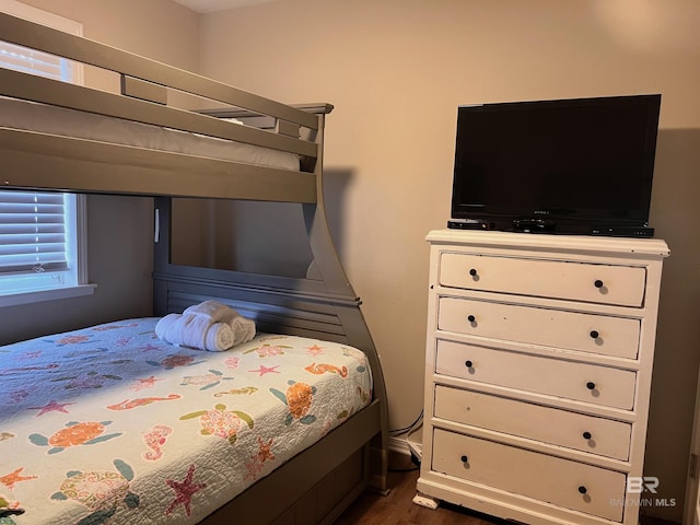 403 E Bernard Ct, Gulf Shores, AL 36542 - bedroom featuring dark wood-type flooring