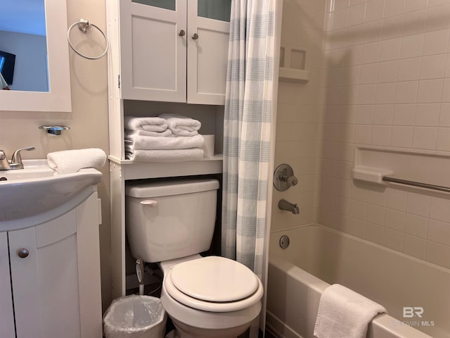 full bathroom featuring shower / bathtub combination with curtain, toilet, and vanity