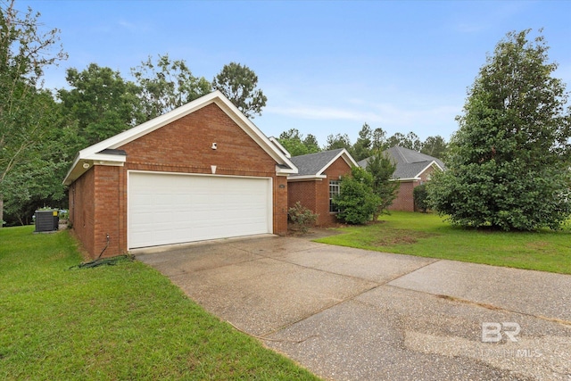 1521 E Peyton Dr, Mobile, AL 36695 - view of front of home featuring brick siding, a front yard, concrete driveway, and central air condition unit