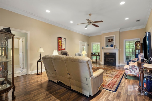 1521 E Peyton Dr, Mobile, AL 36695 - living room with ceiling fan, wood finished floors, recessed lighting, baseboards, and a fireplace