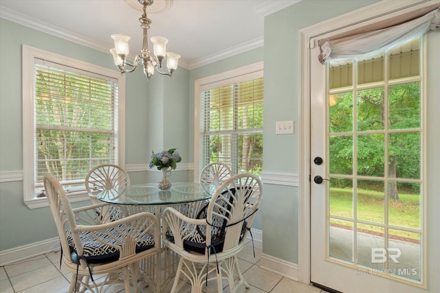 1521 E Peyton Dr, Mobile, AL 36695 - dining area with tile patterned floors, a chandelier, baseboards, and crown molding