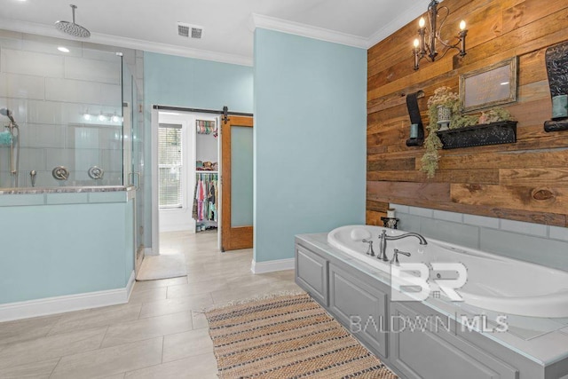 bathroom featuring ornamental molding, tile patterned flooring, a chandelier, and independent shower and bath