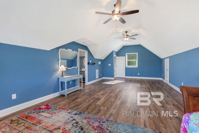 bonus room featuring ceiling fan, wood-type flooring, and vaulted ceiling