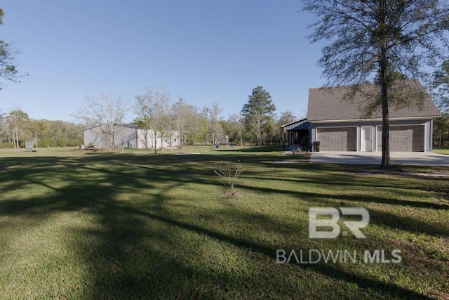 view of yard with a garage