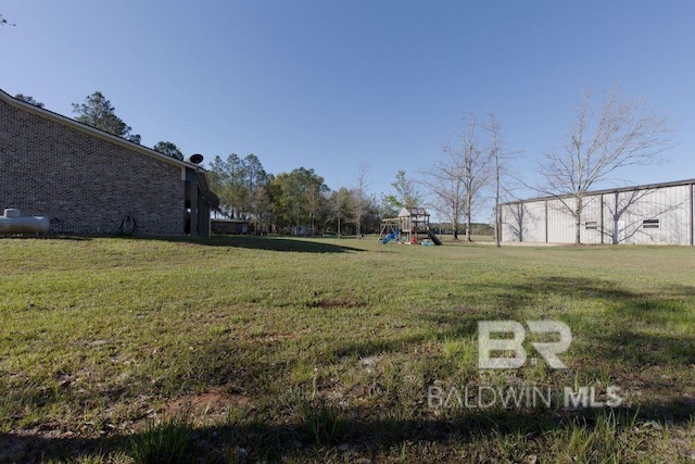 view of yard featuring a playground