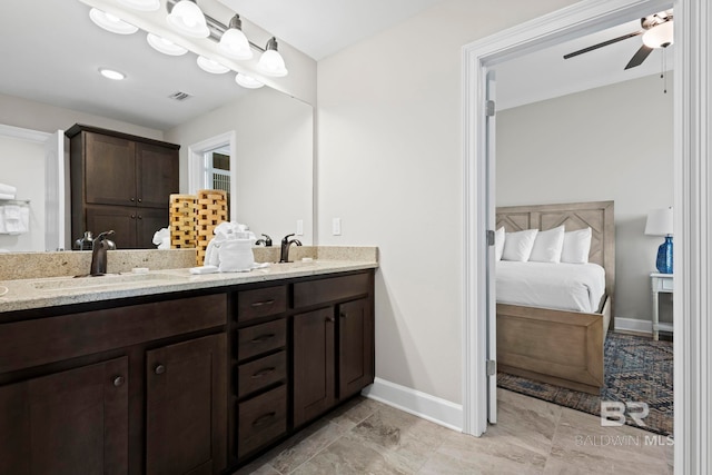 bathroom with vanity and ceiling fan