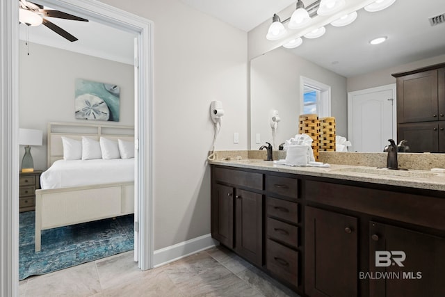 bathroom featuring vanity and ceiling fan