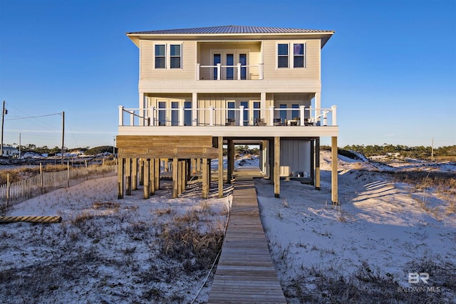 view of front of home with a balcony