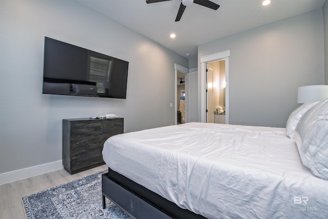 bedroom featuring light wood-type flooring and ceiling fan