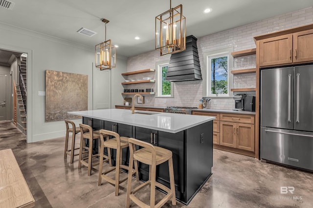 kitchen with high end fridge, open shelves, a sink, concrete flooring, and recessed lighting