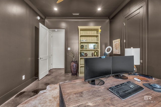 office space with baseboards, concrete flooring, and recessed lighting