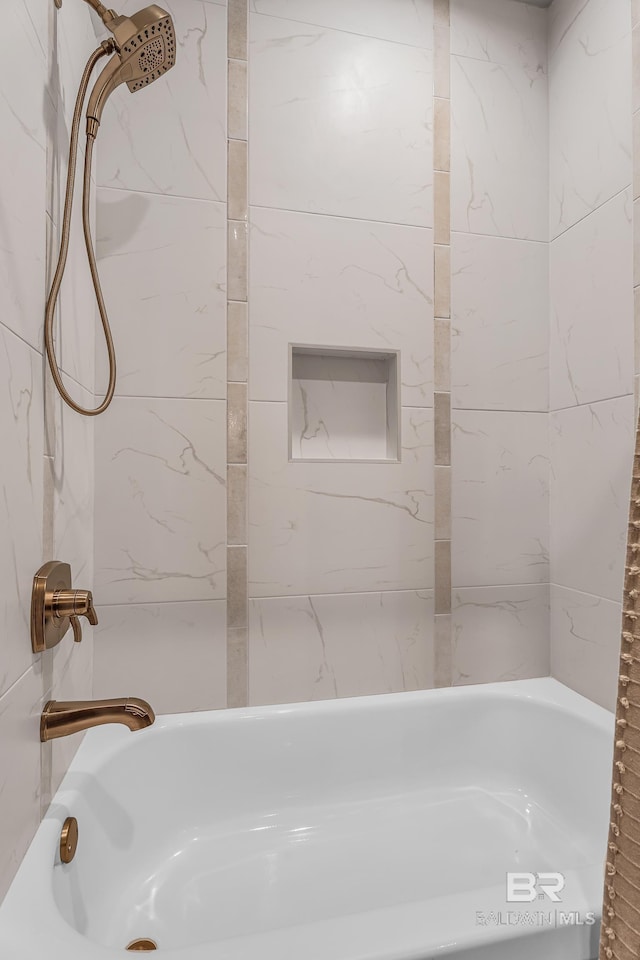 full bathroom with shower / bath combination