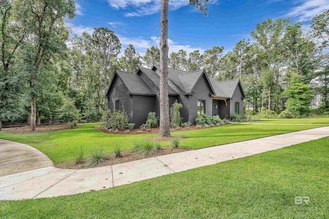 view of property exterior featuring a yard