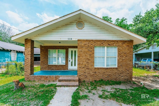 bungalow-style home featuring covered porch