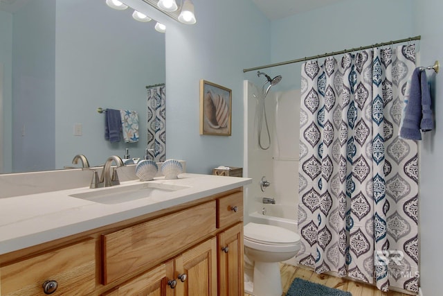 bathroom with toilet, shower / bath combo, wood finished floors, and vanity