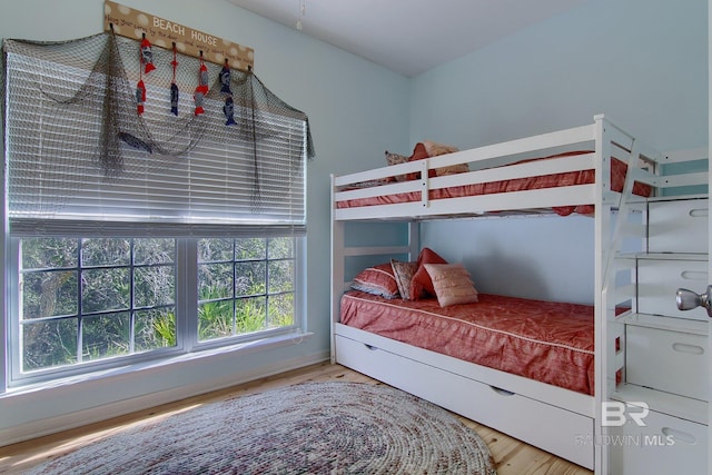 bedroom featuring wood finished floors