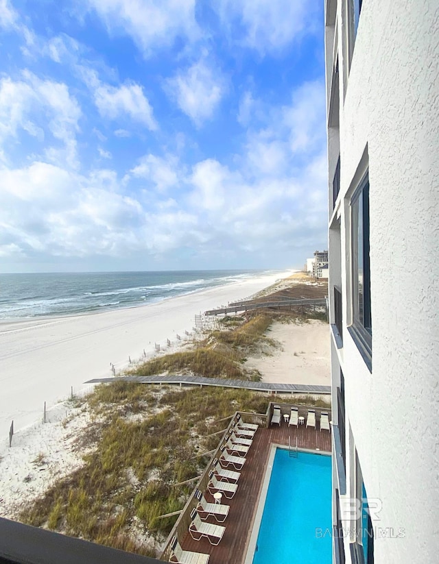 exterior space with a beach view