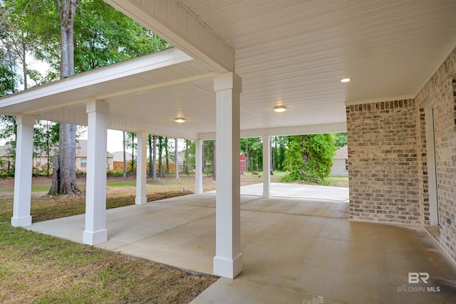 view of patio featuring a carport