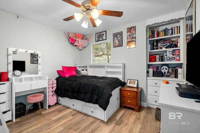 bedroom featuring light wood-type flooring and ceiling fan