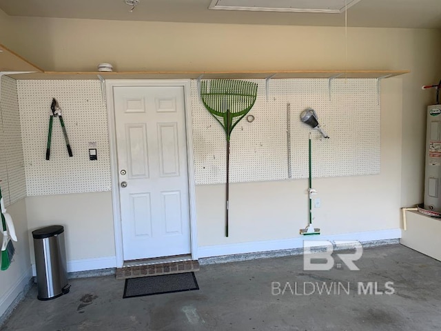 doorway to property featuring water heater