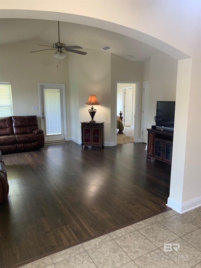 living room with high vaulted ceiling, light wood-type flooring, and ceiling fan