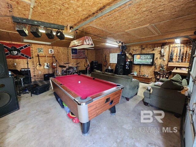 game room with concrete floors and pool table