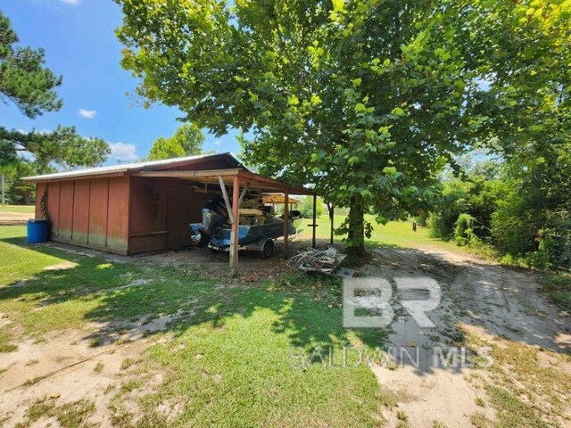 view of yard featuring a carport