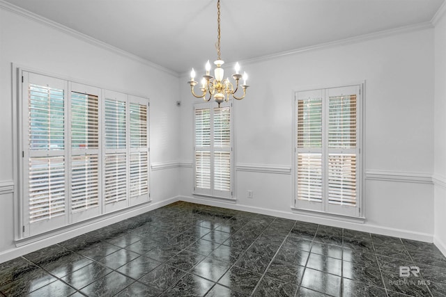 unfurnished dining area with crown molding and a chandelier